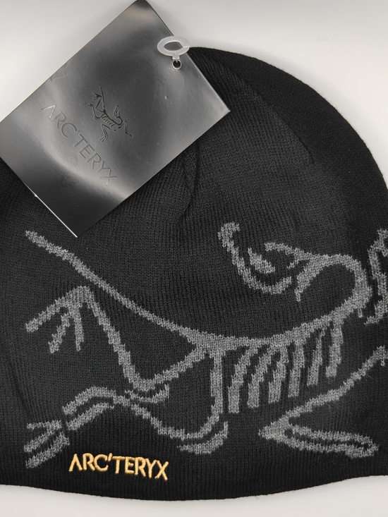Arc'teryx Other - Arc'teryx Black Beanie with Gray Graphic and Gold Embroidered Logo